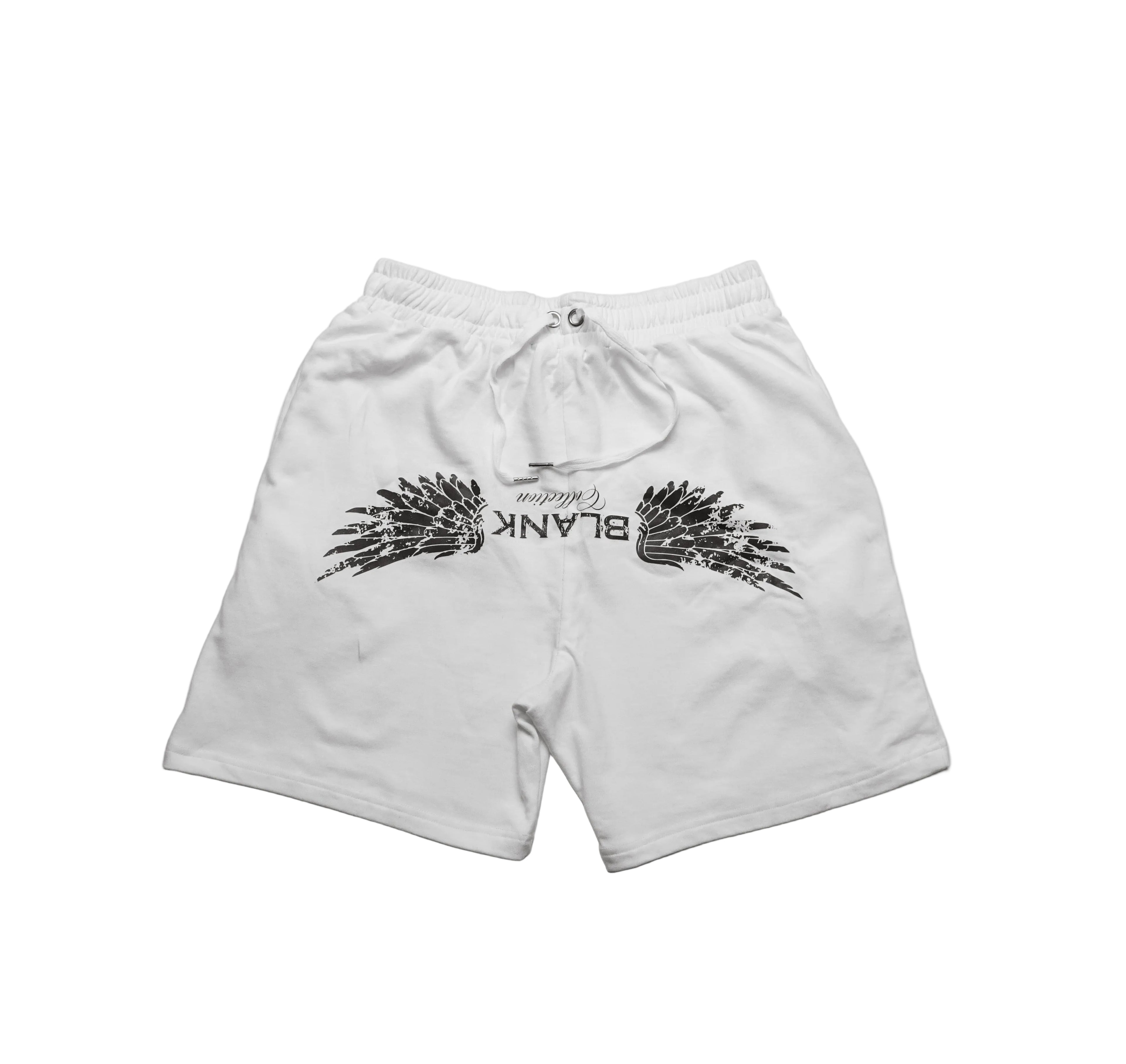 White shorts with black wing design and 'BLANK' text on a light gray background